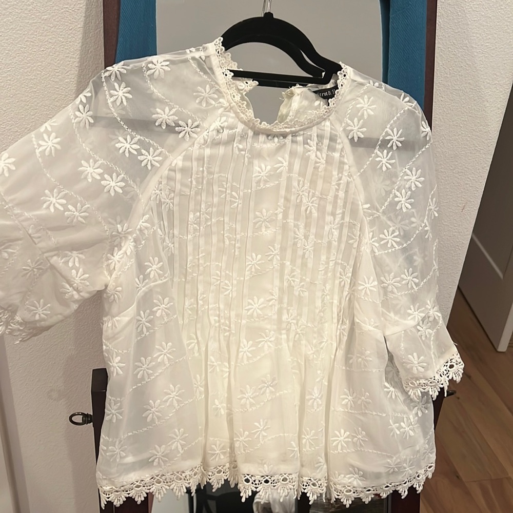 White lace top. Beautiful embroidered flowers! Brand new bought from vici